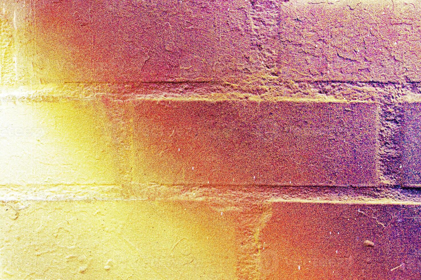 A fragment of colorful graffiti painted on a wall. Abstract urban background. photo