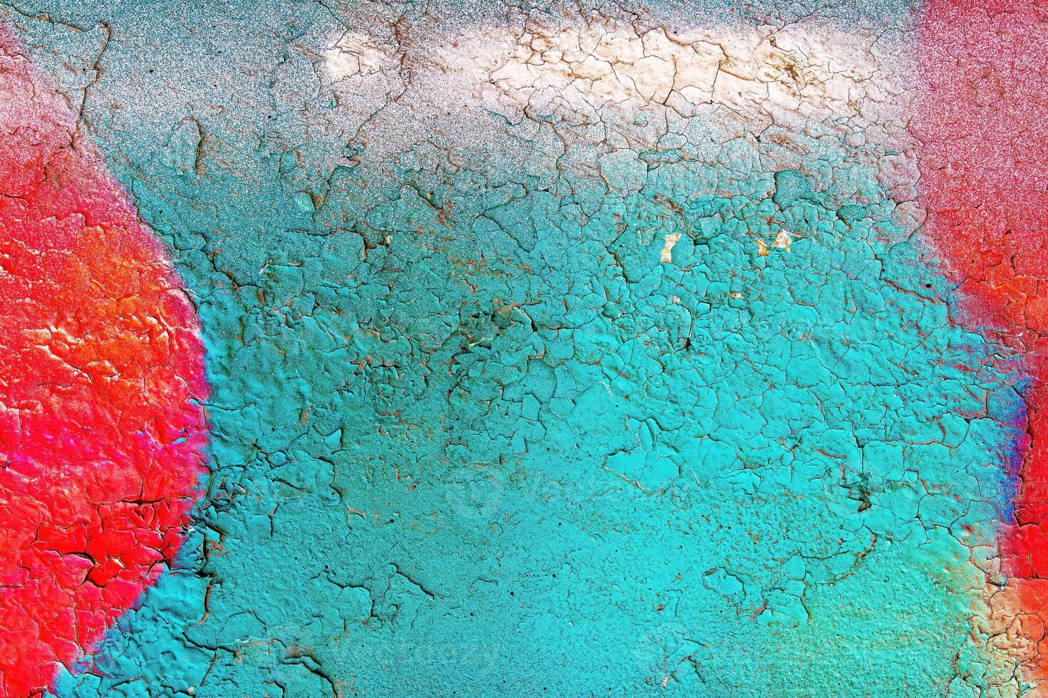 A fragment of colorful graffiti painted on a wall. Abstract urban background. photo