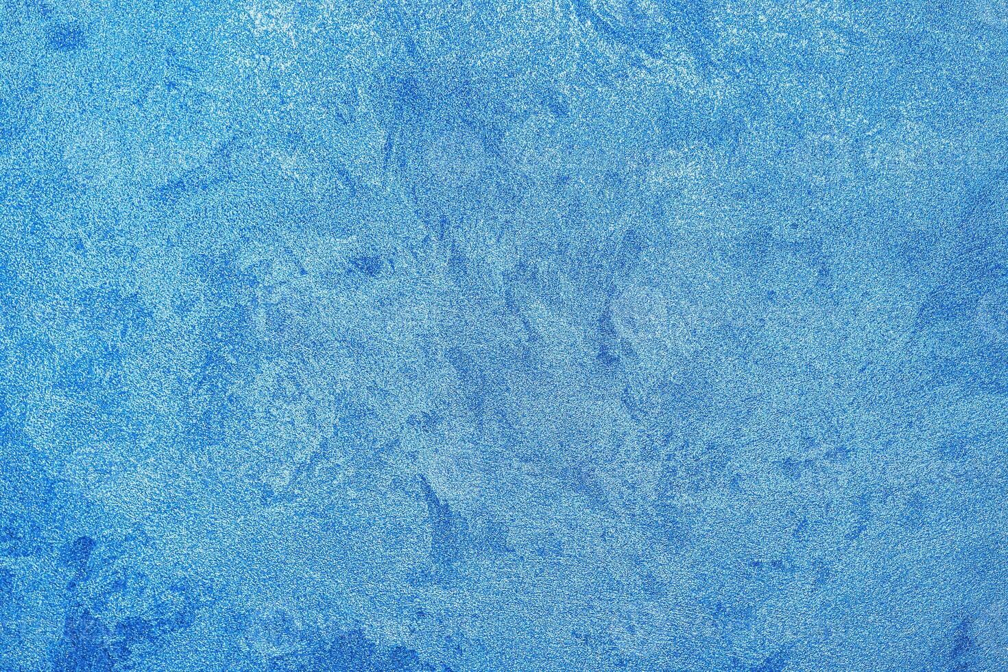 Texture of blue decorative plaster or concrete. Abstract grunge background. photo