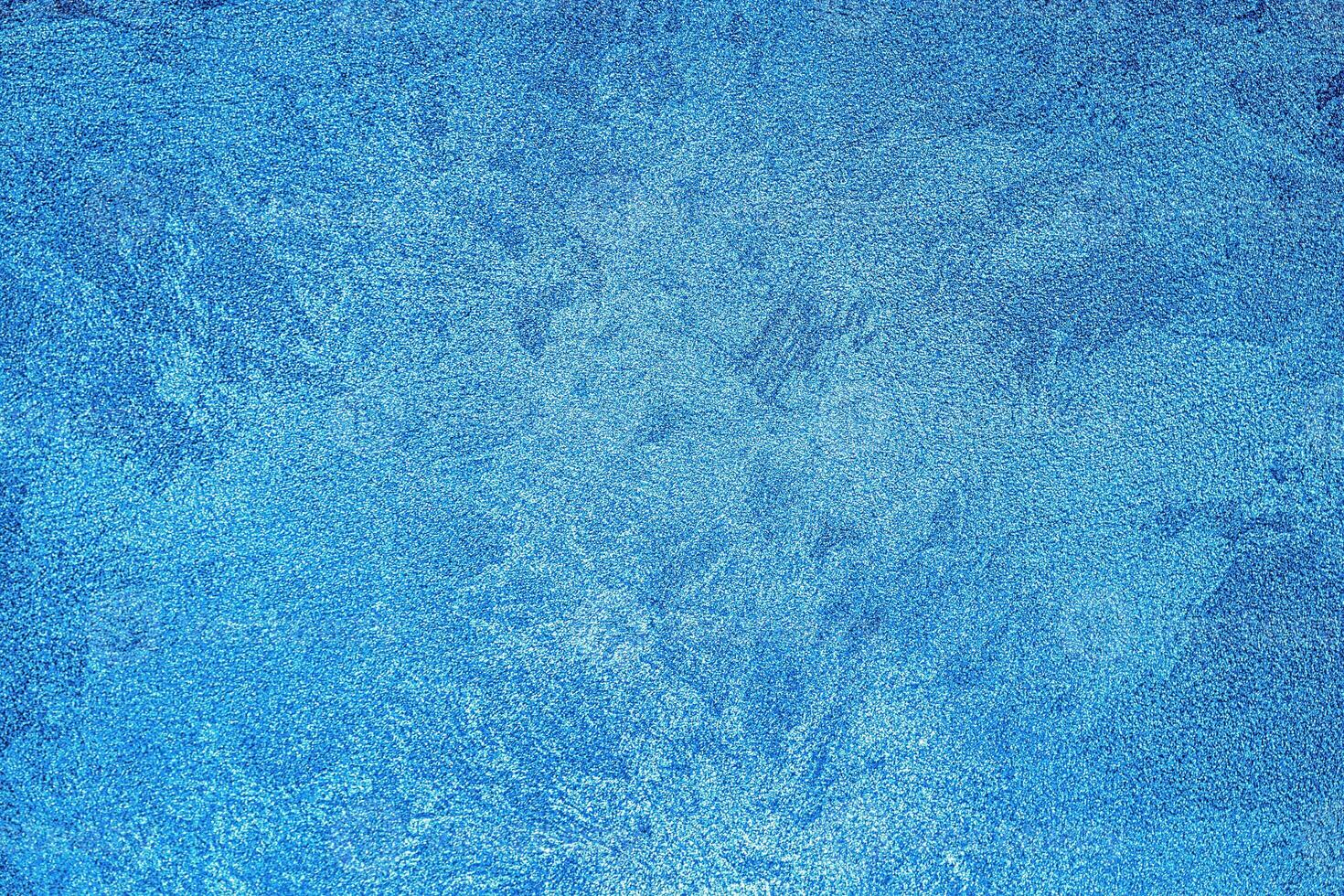 Texture of blue decorative plaster or concrete. Abstract grunge background. photo