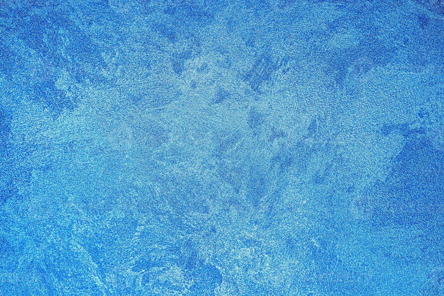 Texture of blue decorative plaster or concrete. Abstract grunge background. photo