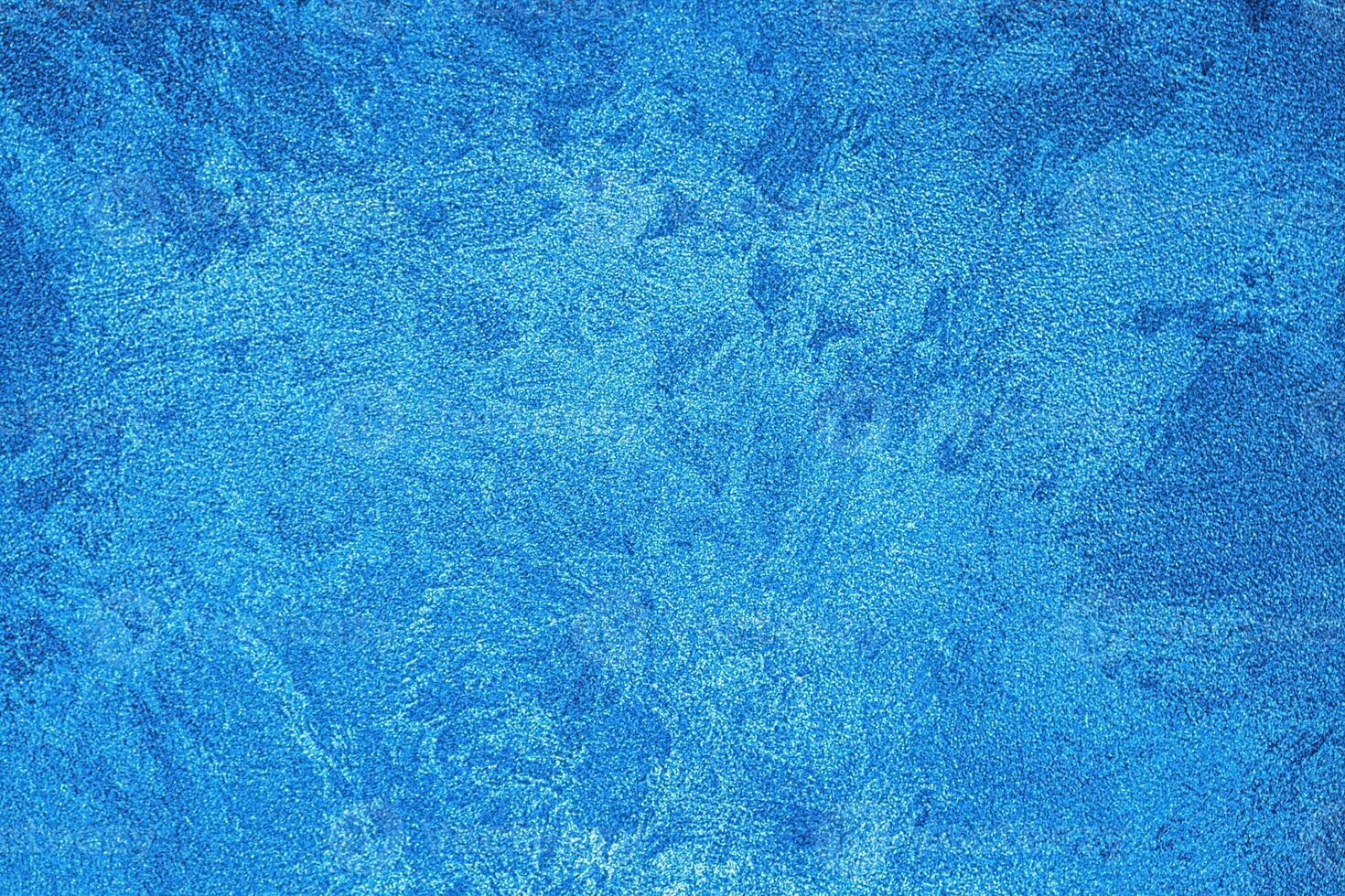 Texture of blue decorative plaster or concrete. Abstract grunge background. photo