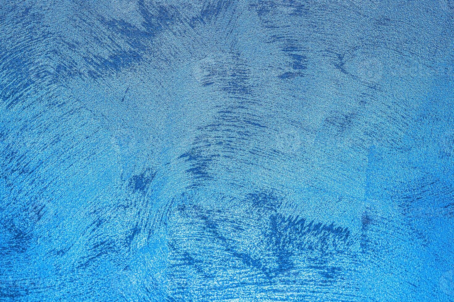 Texture of blue decorative plaster or concrete. Abstract grunge background. photo