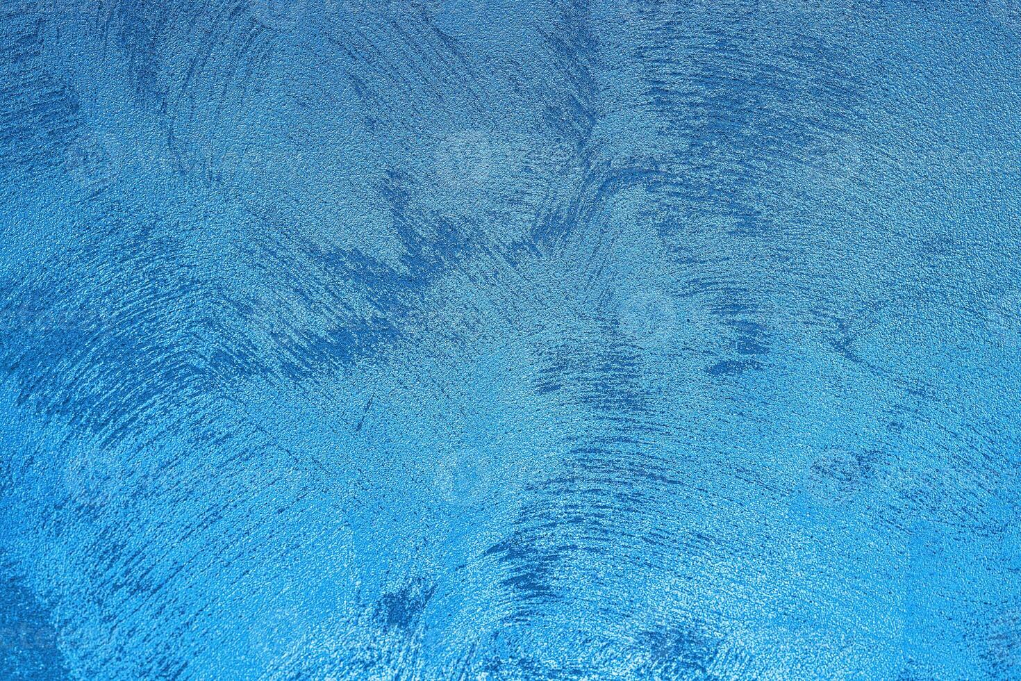 Texture of blue decorative plaster or concrete. Abstract grunge background. photo