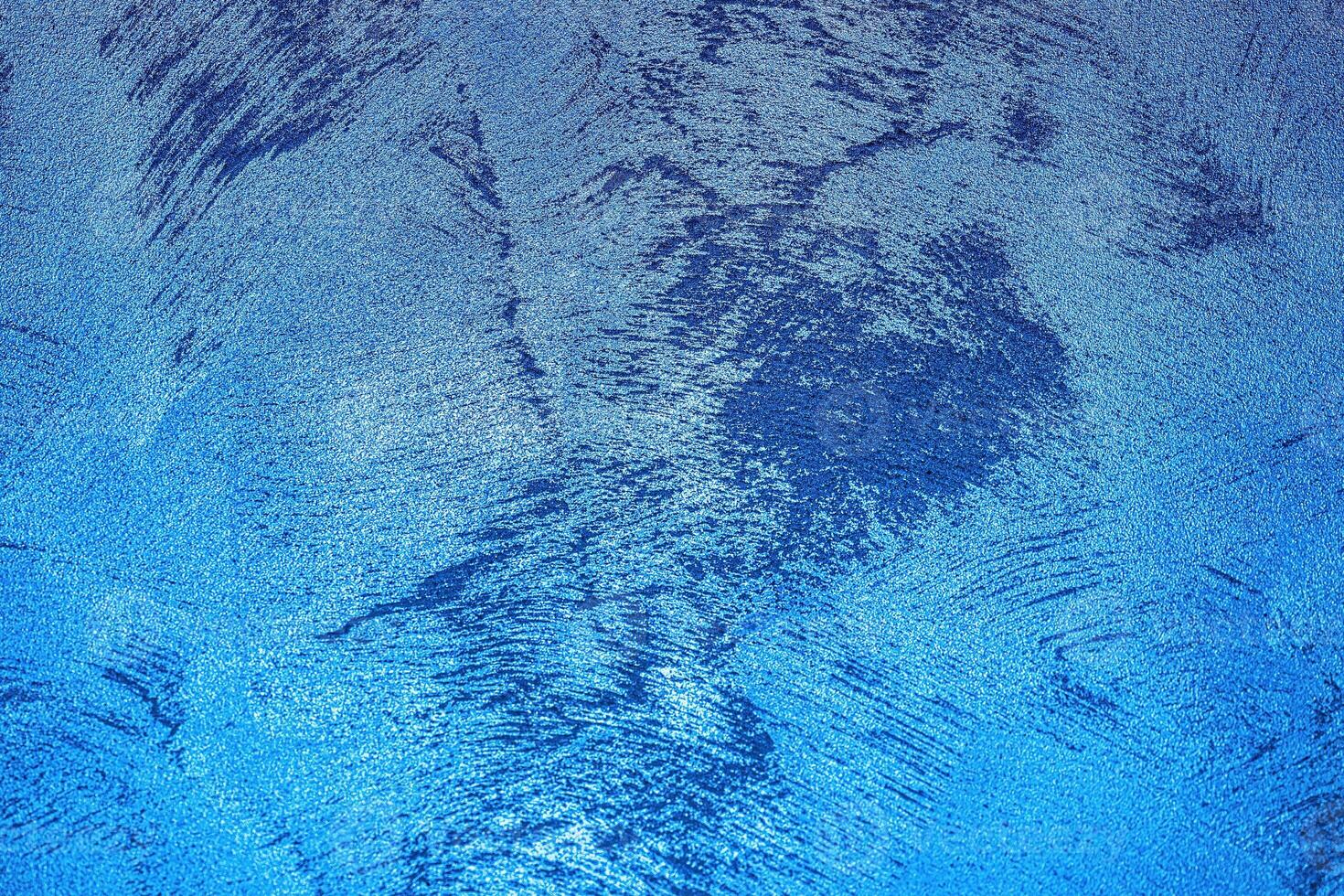 Texture of blue decorative plaster or concrete. Abstract grunge background. photo