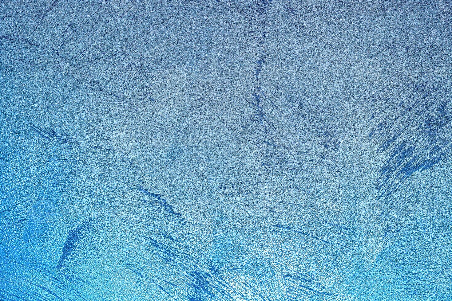 Texture of blue decorative plaster or concrete. Abstract grunge background. photo