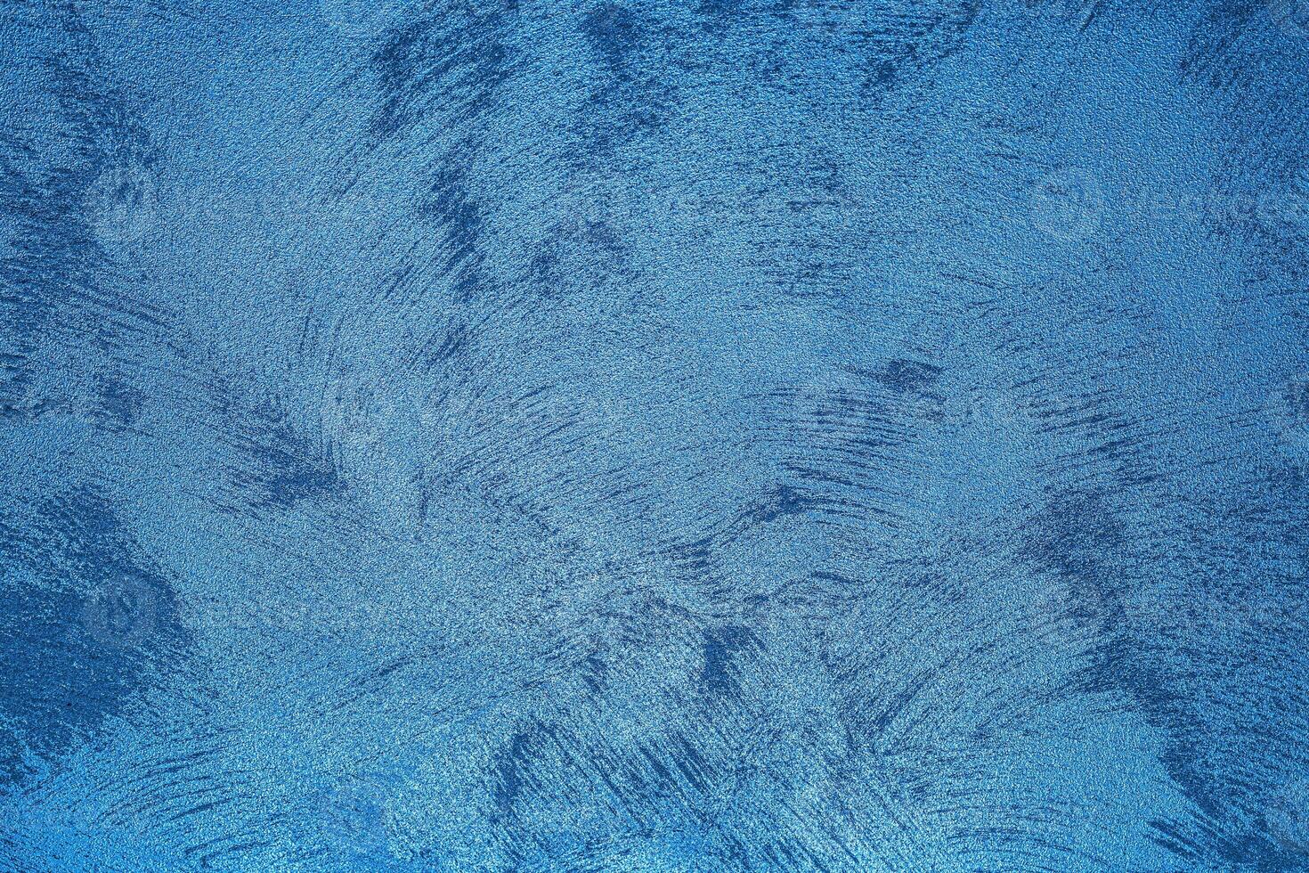 Texture of blue decorative plaster or concrete. Abstract grunge background. photo