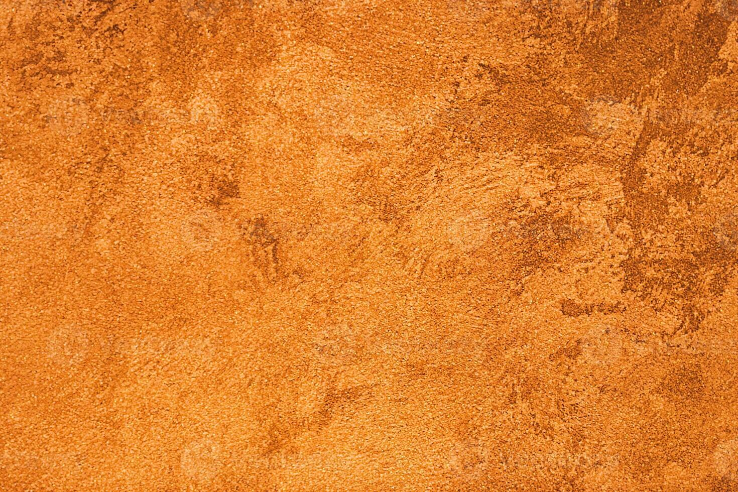 Texture of orange decorative plaster or concrete. Abstract grunge background. photo
