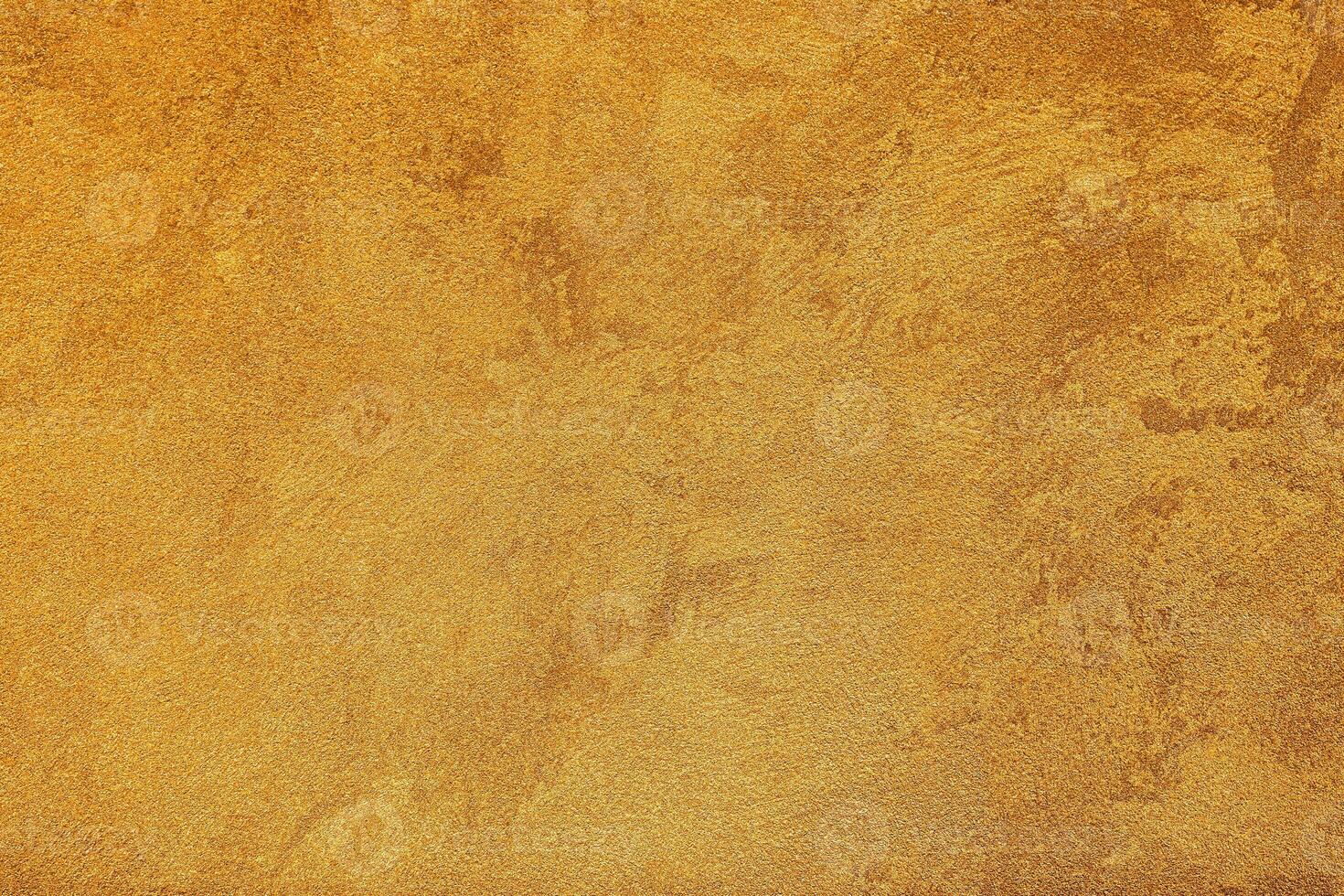 Texture of golden decorative plaster or concrete. Abstract grunge background. photo