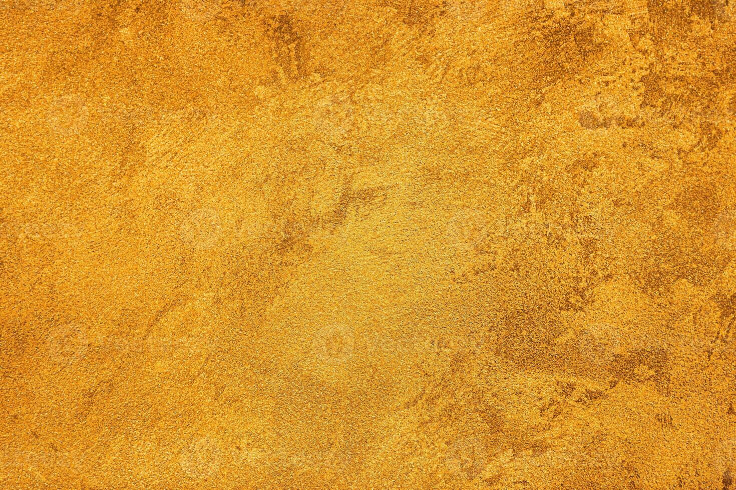 Texture of golden decorative plaster or concrete. Abstract grunge background. photo