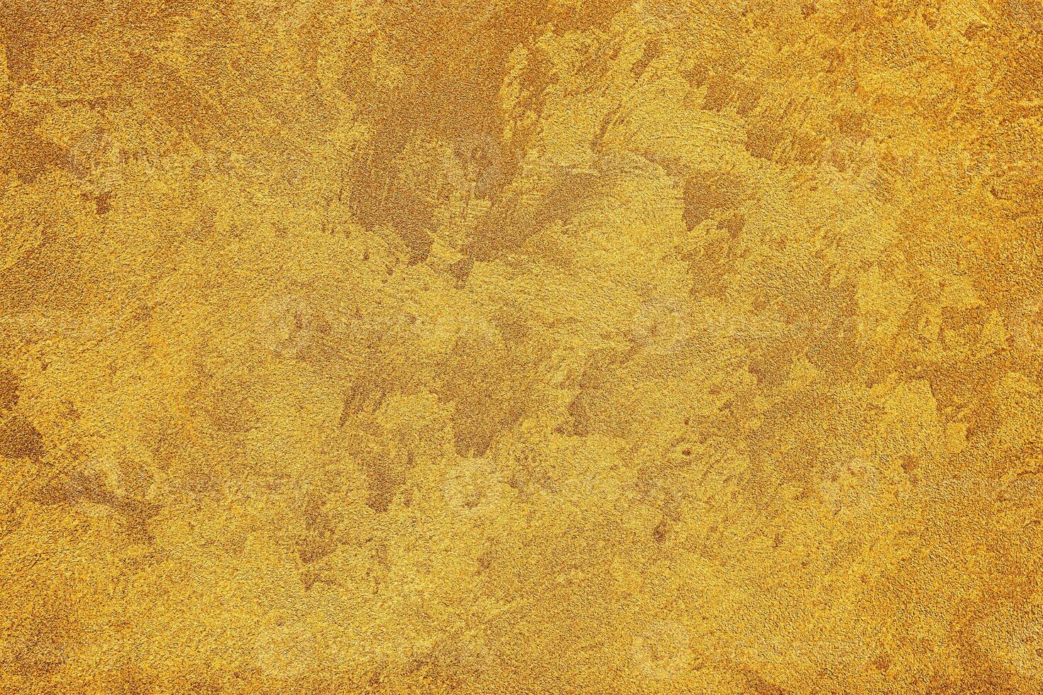 Texture of golden decorative plaster or concrete. Abstract grunge background. photo