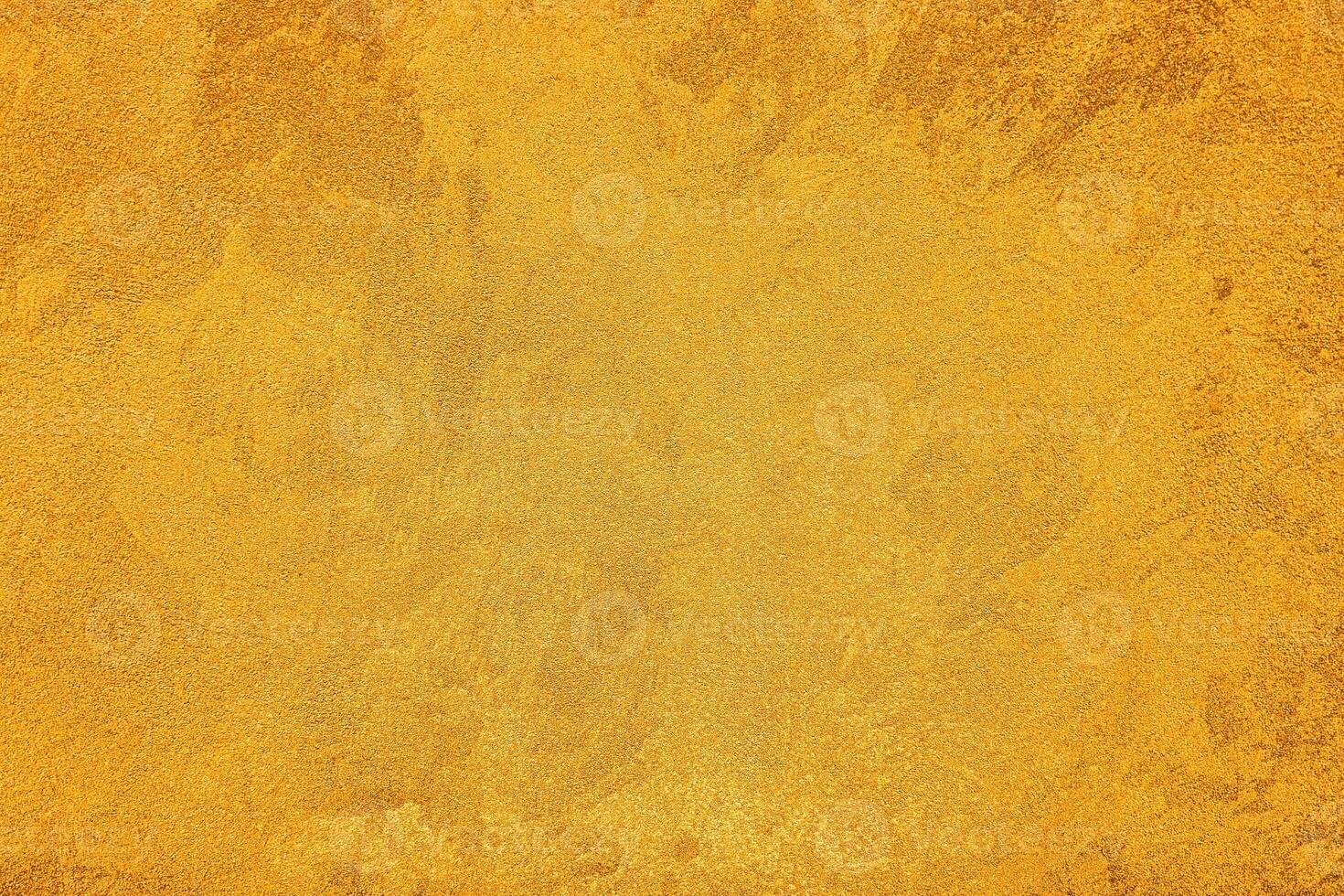 Texture of golden decorative plaster or concrete. Abstract grunge background. photo