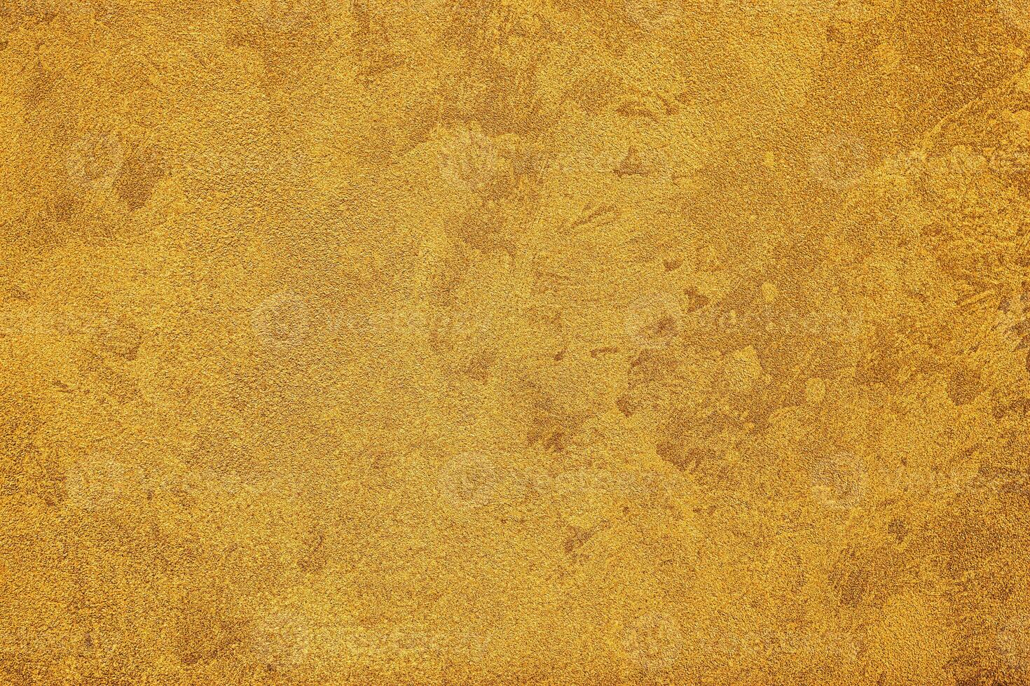 Texture of golden decorative plaster or concrete. Abstract grunge background. photo