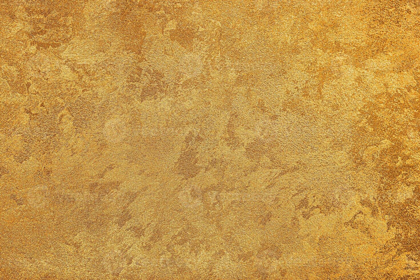 Texture of golden decorative plaster or concrete. Abstract grunge background. photo