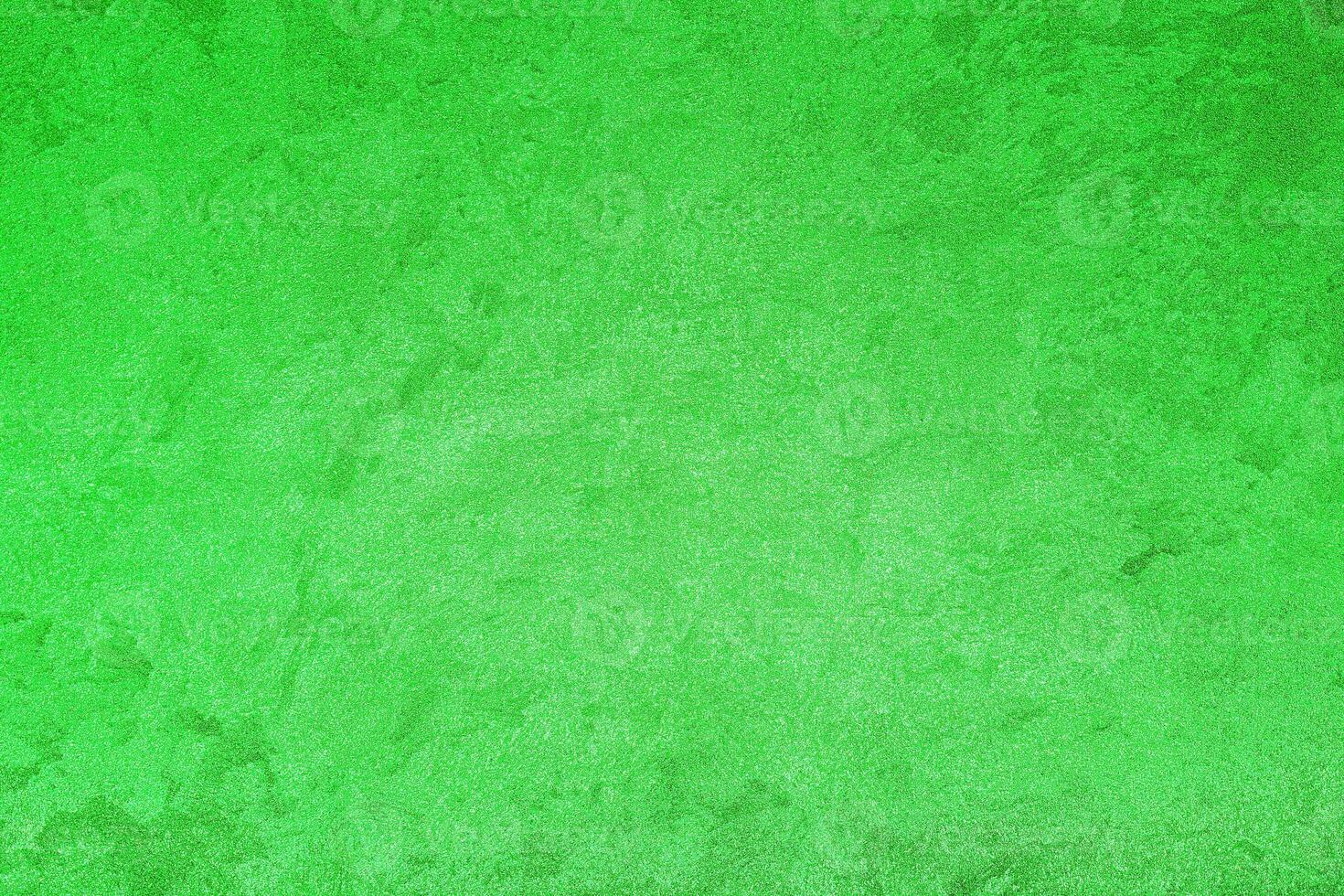 Texture of green decorative plaster or concrete. Abstract grunge background. photo