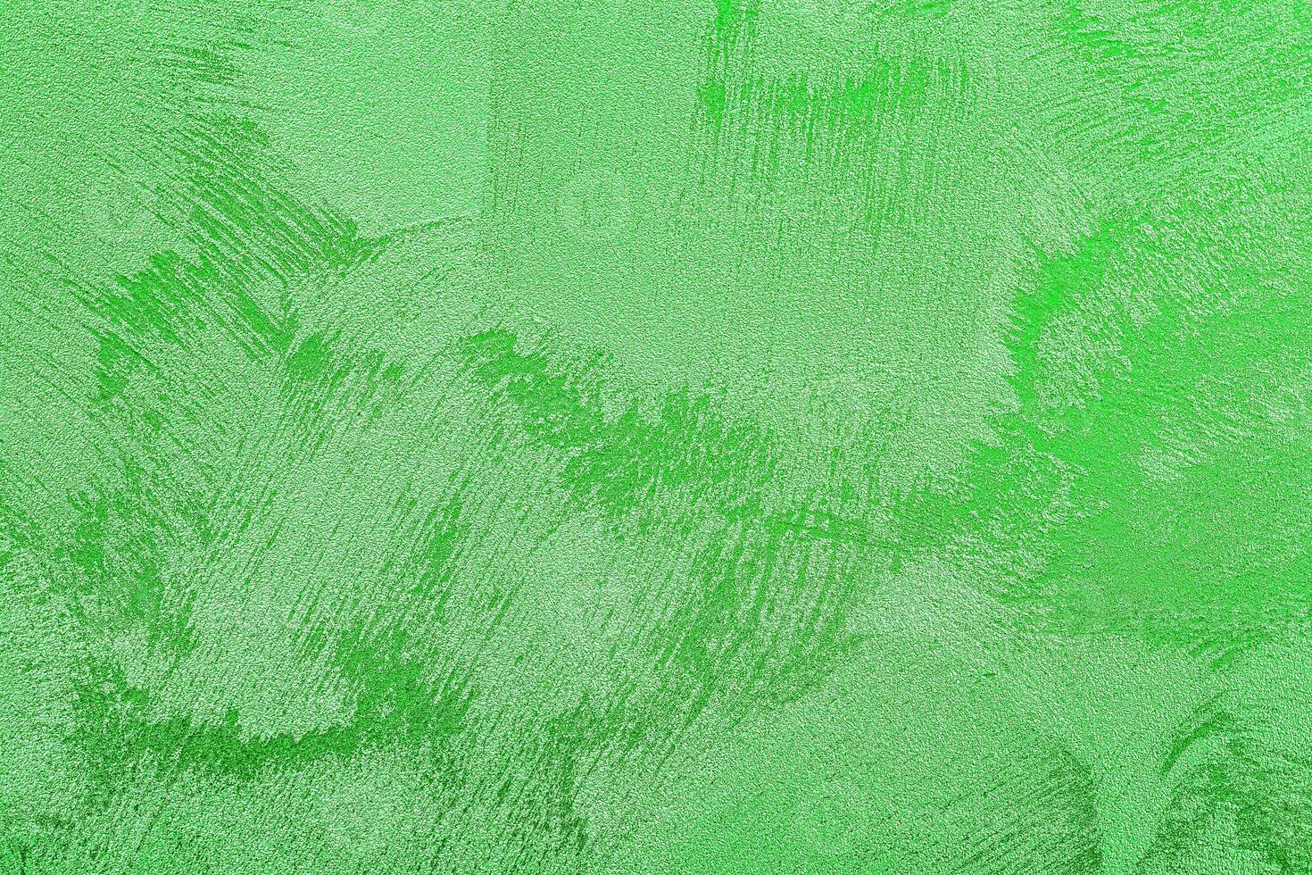 Texture of green decorative plaster or concrete. Abstract grunge background. photo