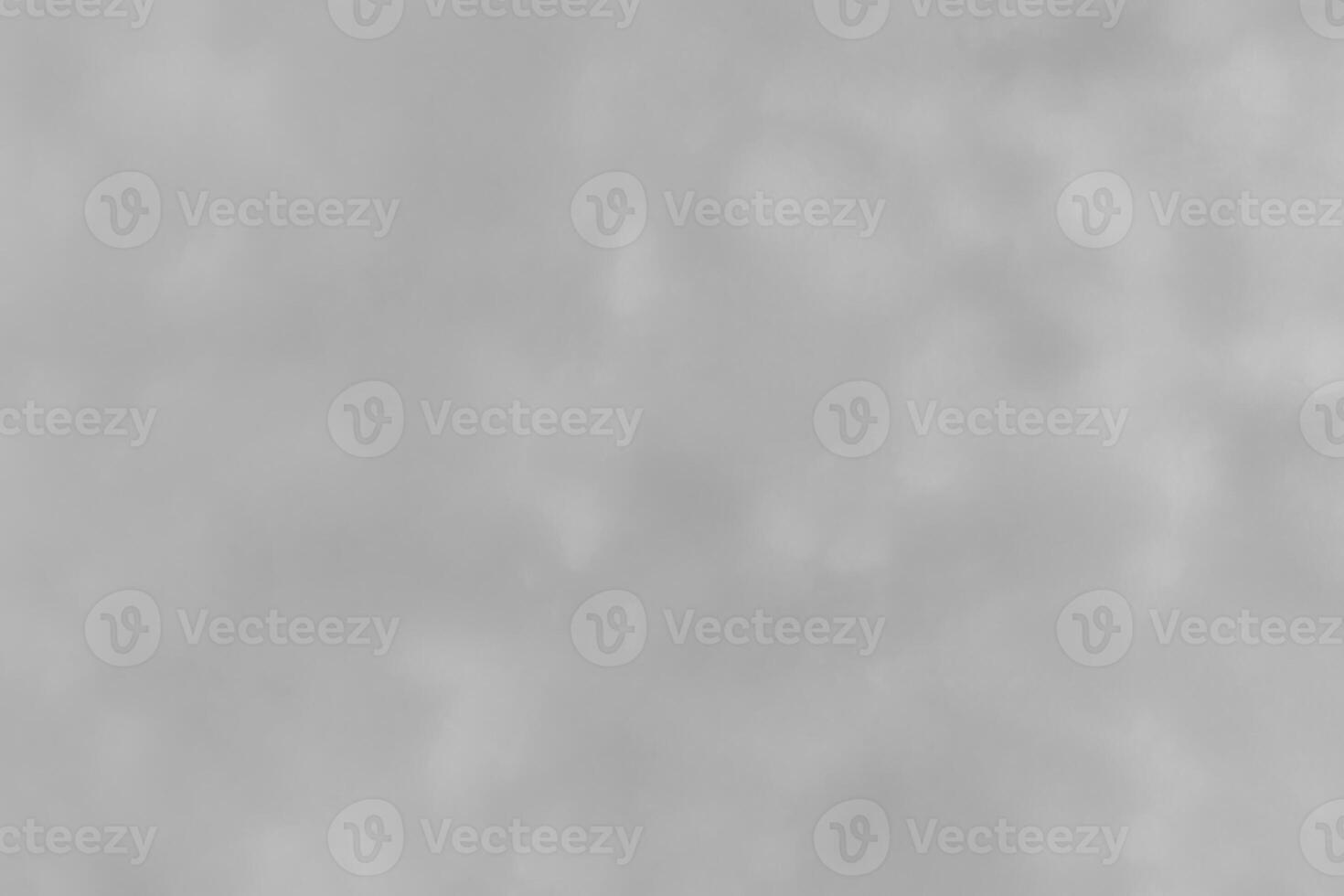 Blured gray decorative plaster or concrete. Abstract grunge background for design. photo