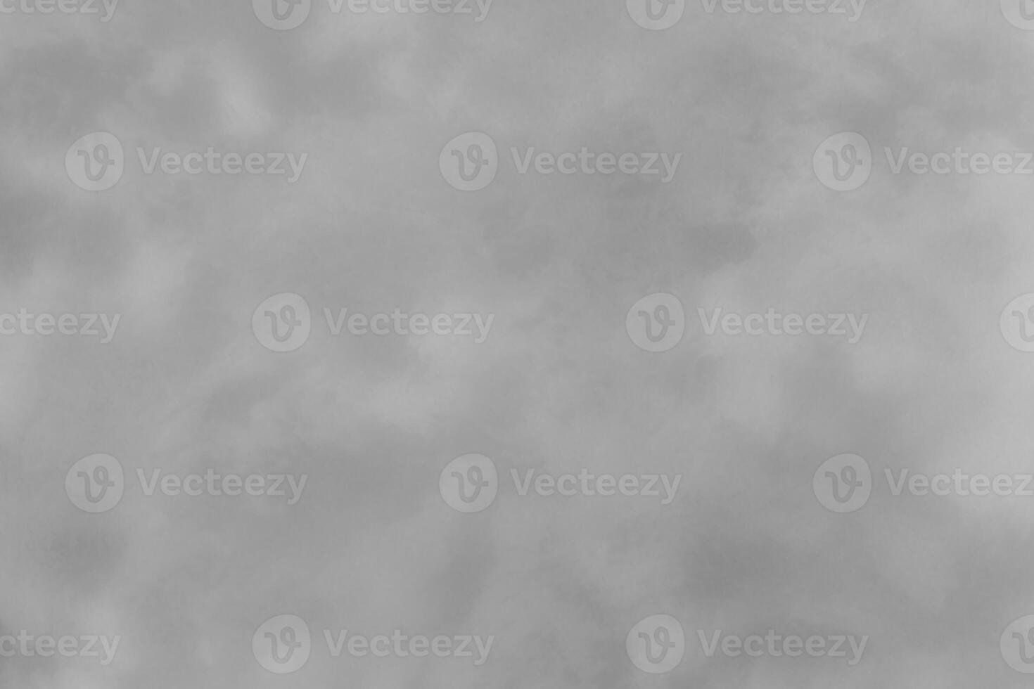 Blured gray decorative plaster or concrete. Abstract grunge background for design. photo