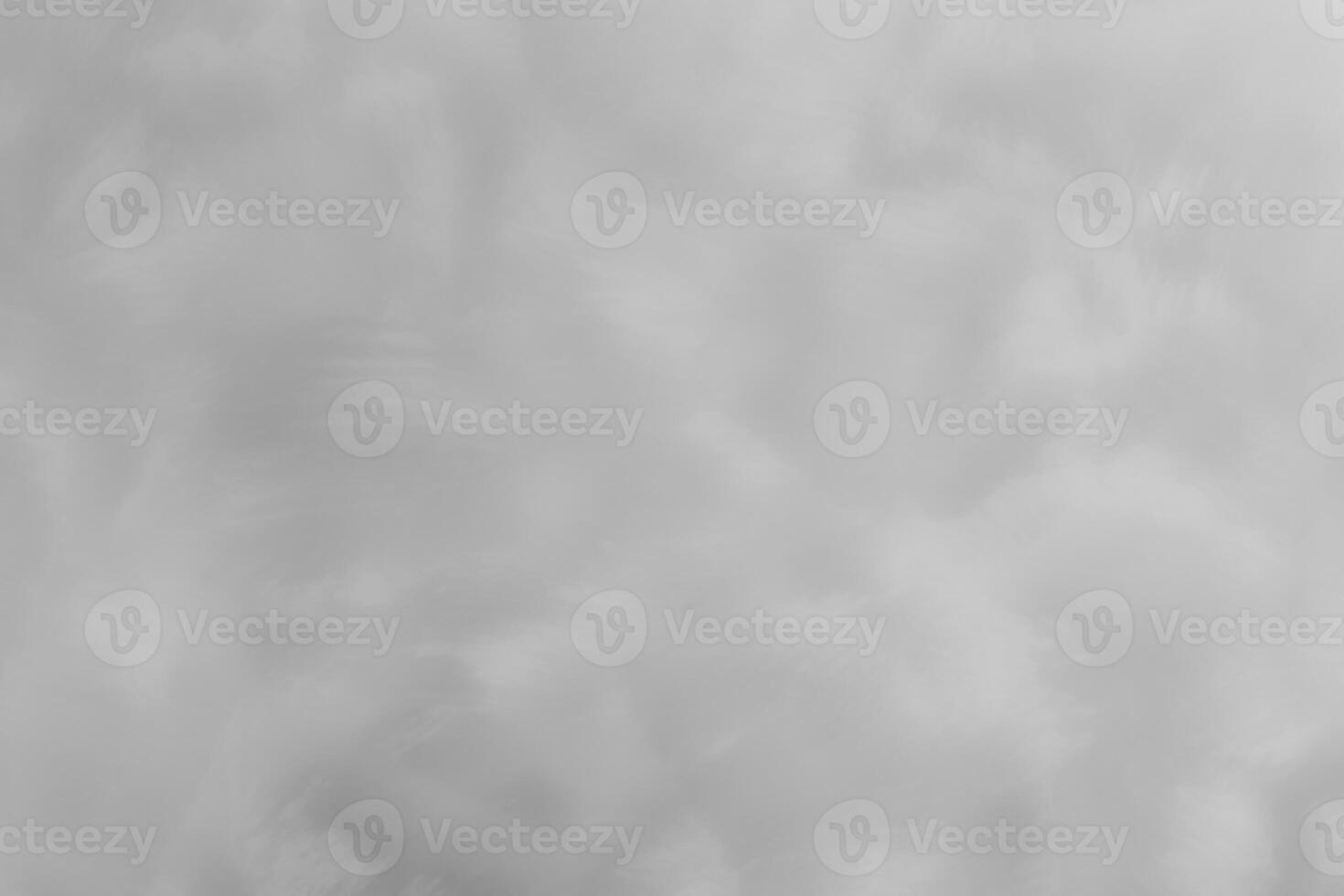 Blured gray decorative plaster or concrete. Abstract grunge background for design. photo