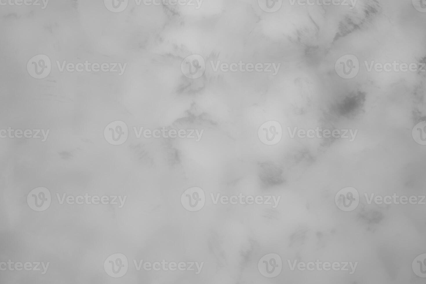 Blured gray decorative plaster or concrete. Abstract grunge background for design. photo