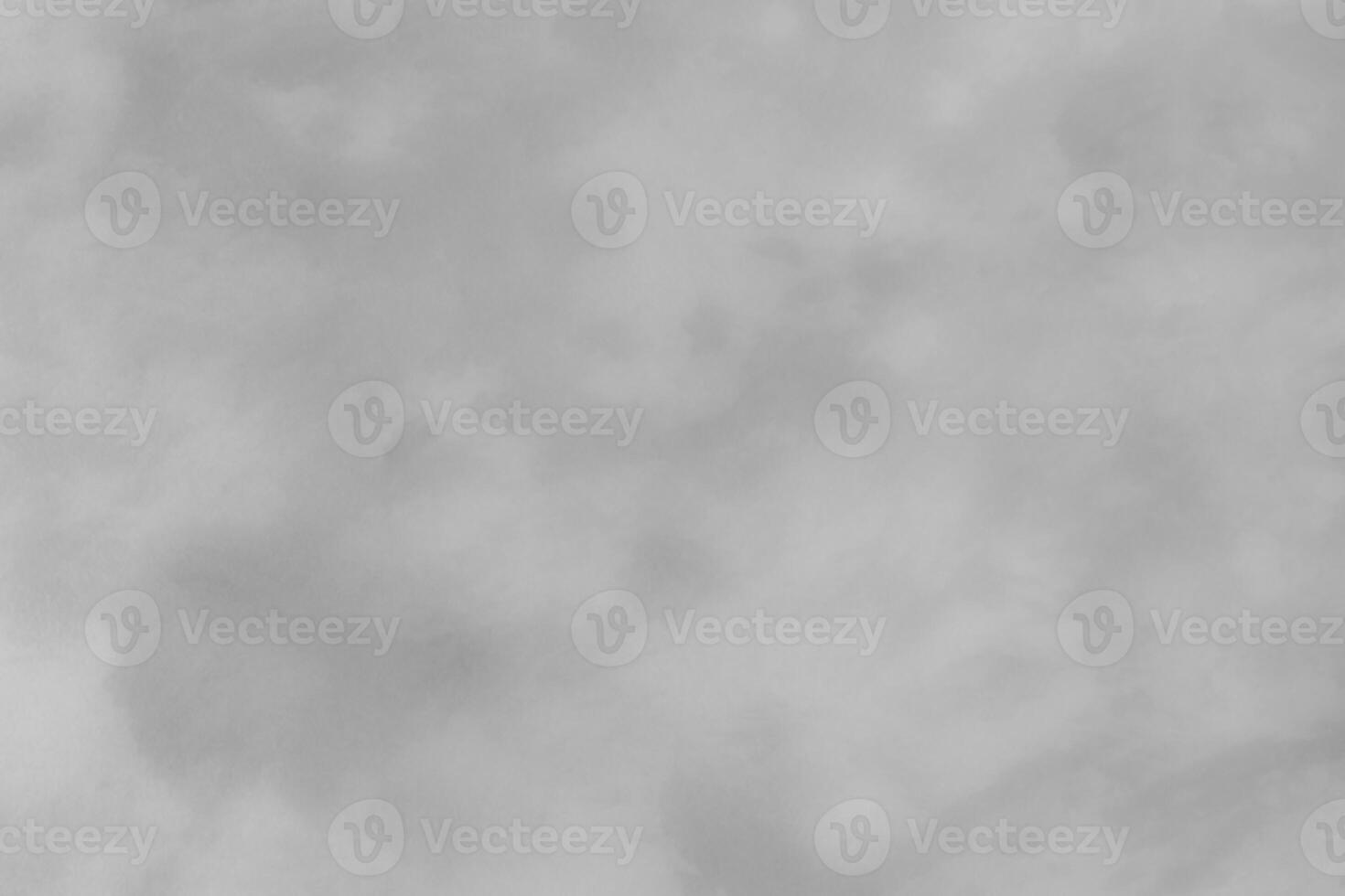Blured gray decorative plaster or concrete. Abstract grunge background for design. photo