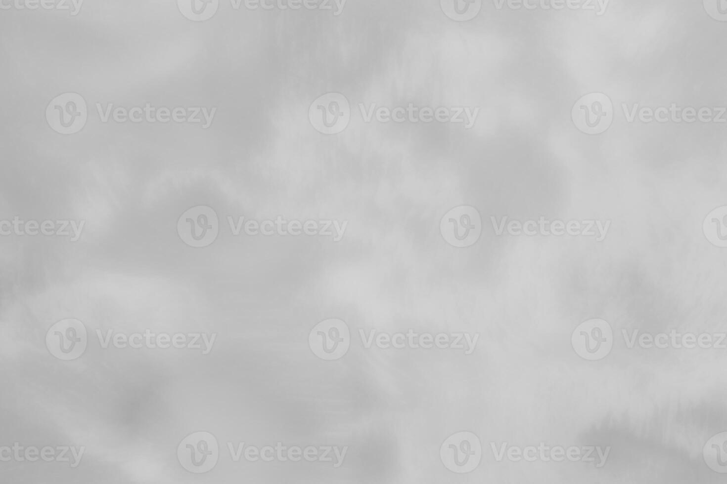 Blured gray decorative plaster or concrete. Abstract grunge background for design. photo