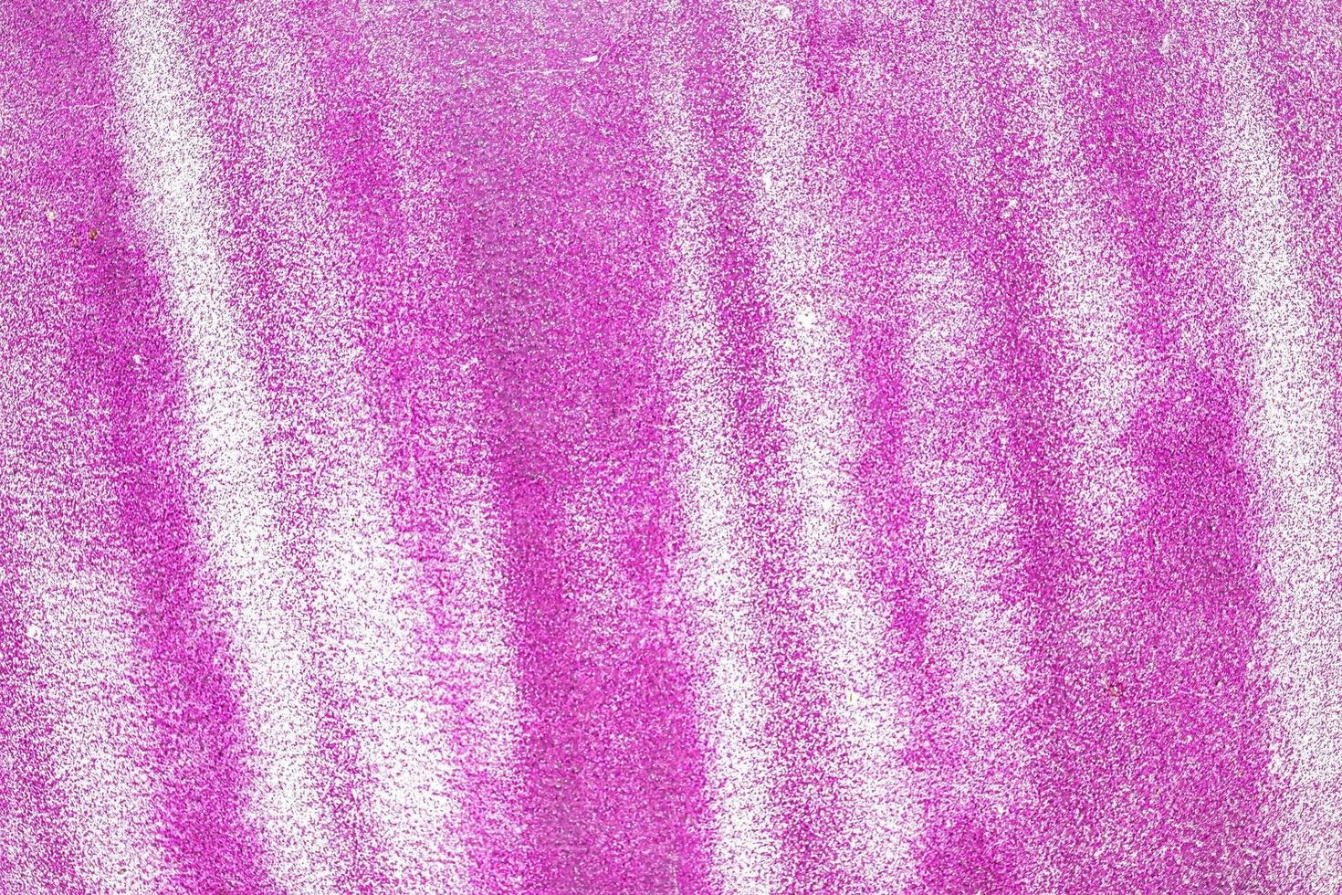 A fragment of colorful graffiti painted on a wall. Abstract urban background. photo