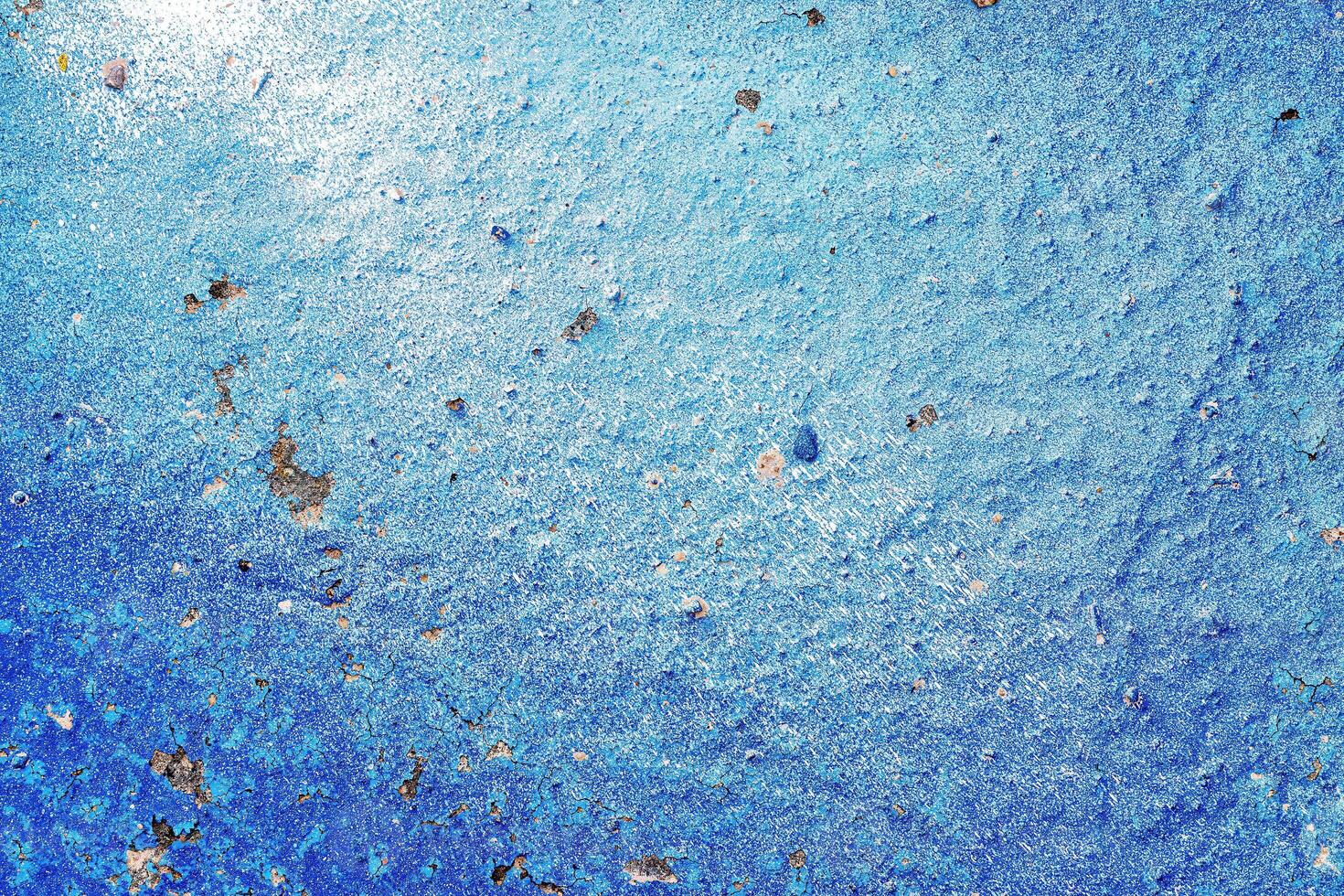 A fragment of colorful graffiti painted on a wall. Abstract urban background. photo
