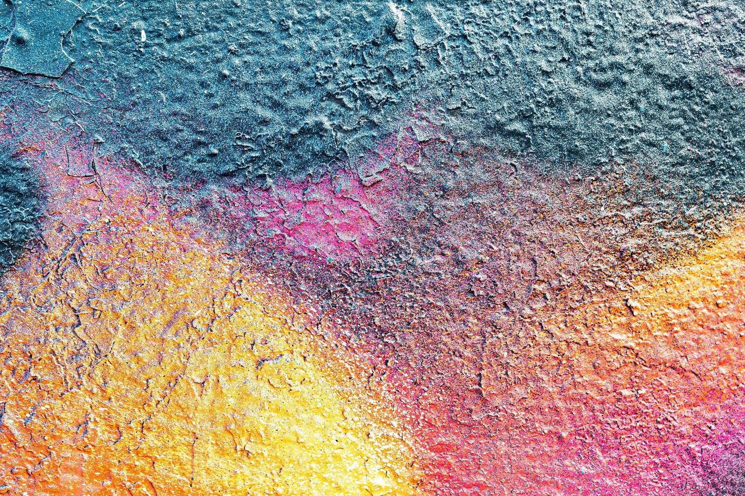 A fragment of colorful graffiti painted on a wall. Abstract urban background. photo