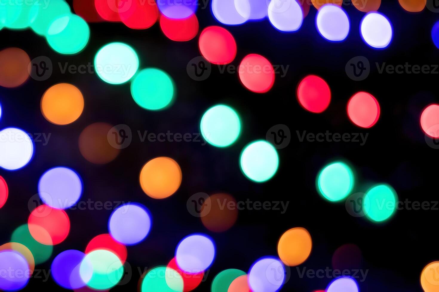 Christmas lights blured background. Light bokeh from Xmas decoration. photo