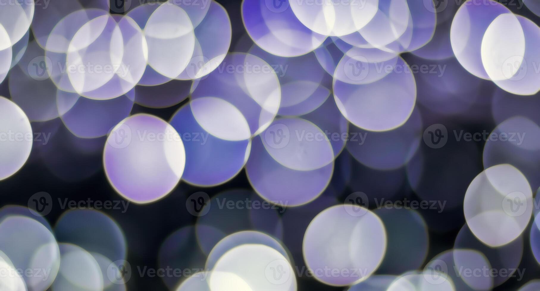 Christmas lights blured background. Light bokeh from Xmas decoration. photo