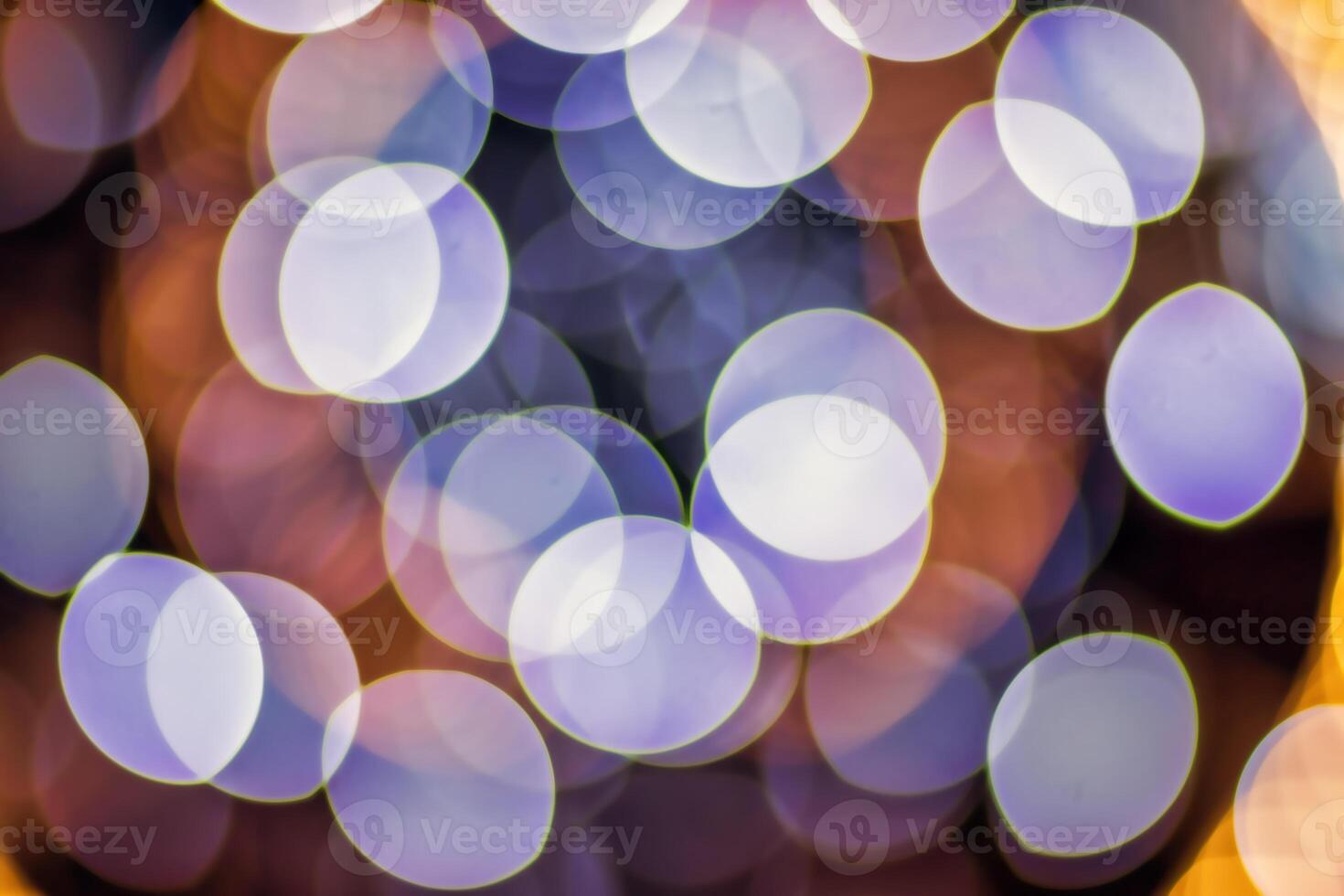 Christmas lights blured background. Light bokeh from Xmas decoration. photo