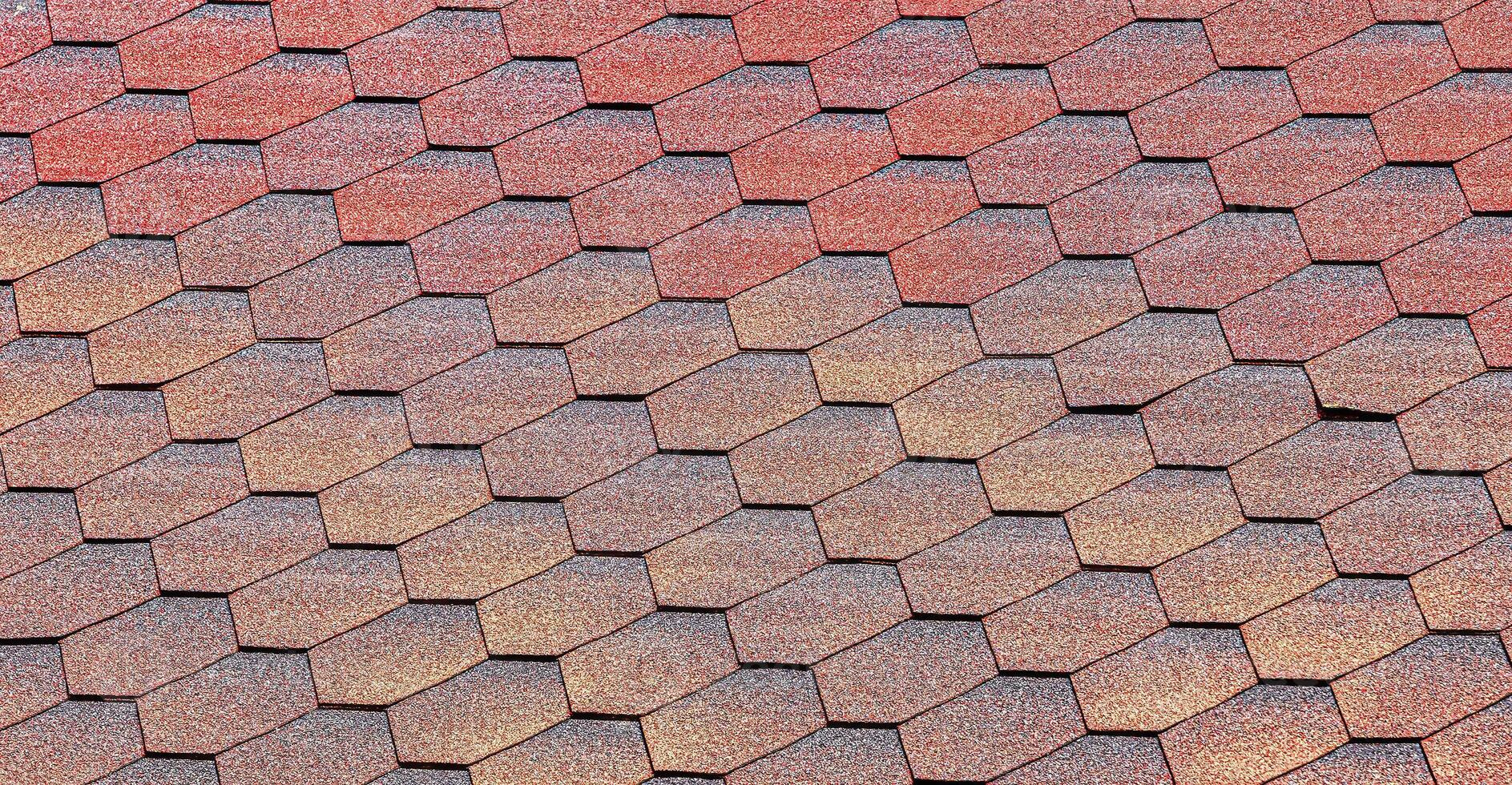 The texture of red tile roof covering. photo