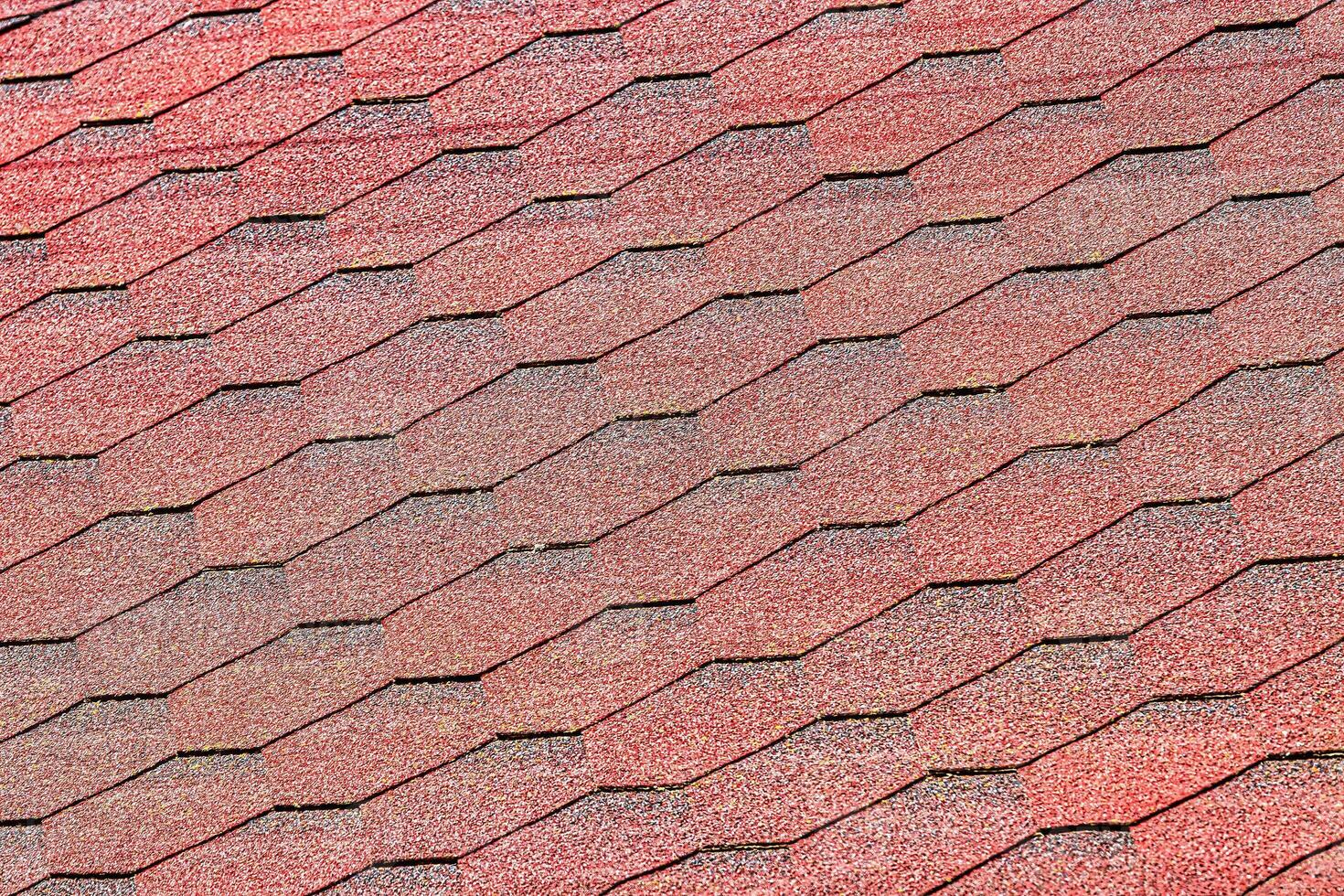 The texture of red tile roof covering. photo