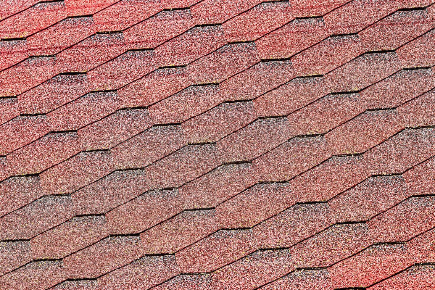 The texture of red tile roof covering. photo