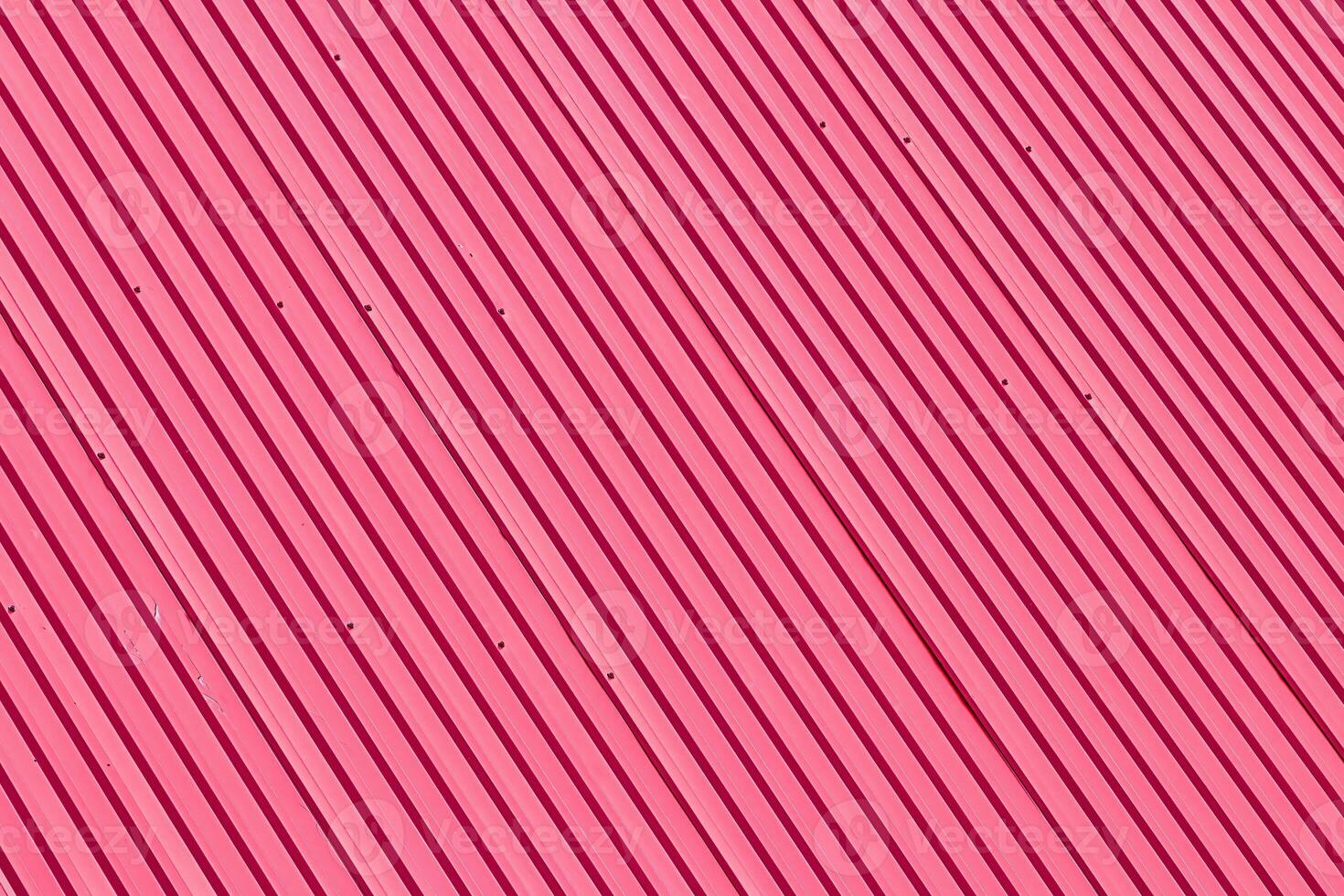 The texture of red metal roof covering. photo