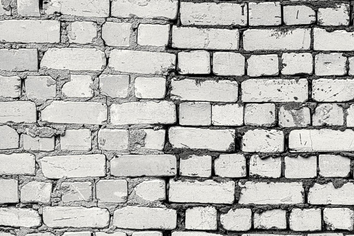 Wall texture from white old damaged bricks. Abstract background. photo