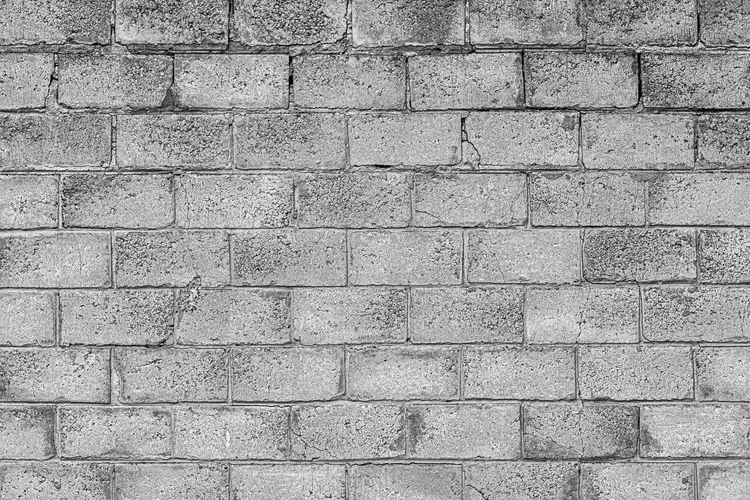 Wall texture from gray concrete old bricks. Abstract background. photo
