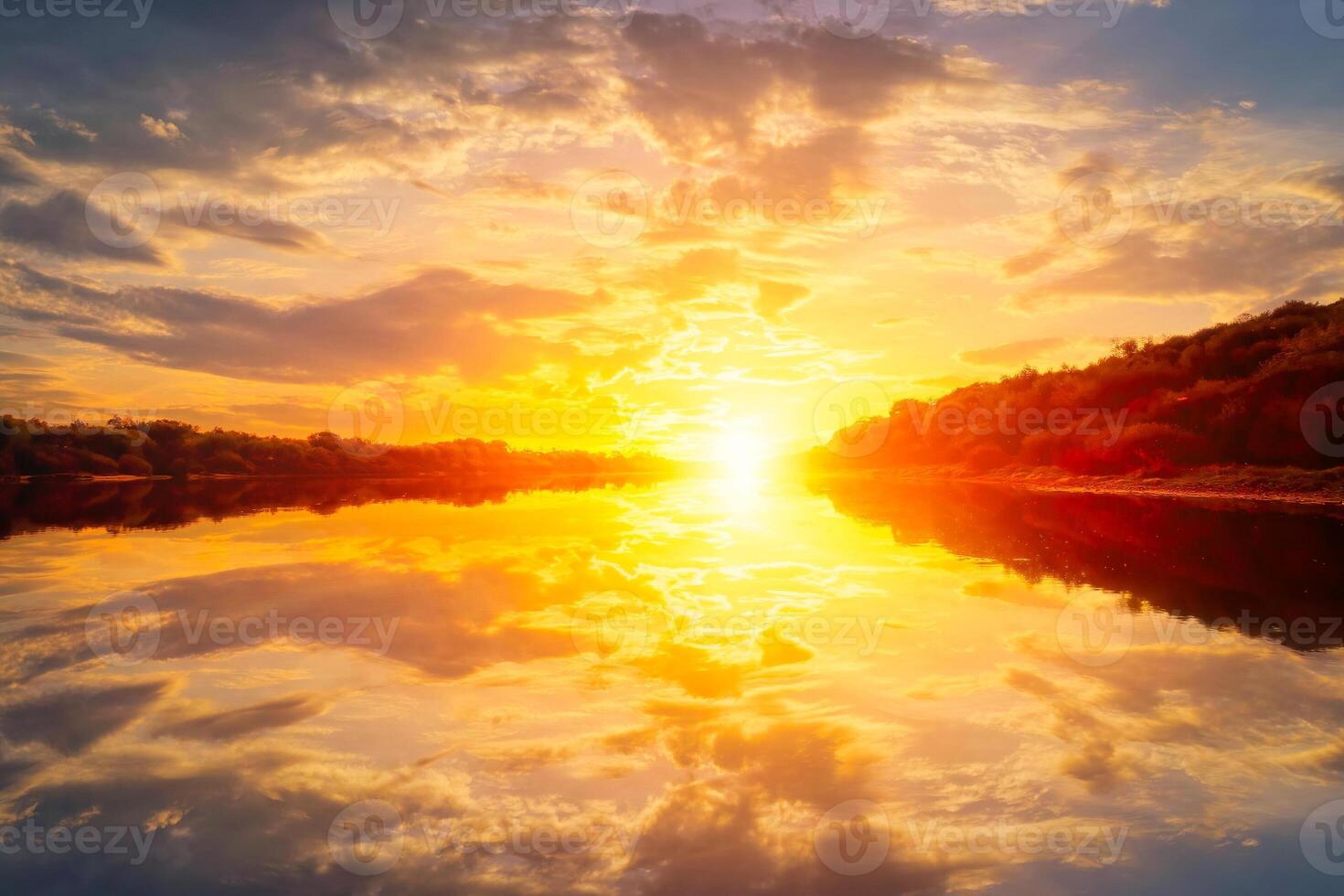 Sunset on the river at summer evening with clouds and trees. Water reflection of a sky. photo