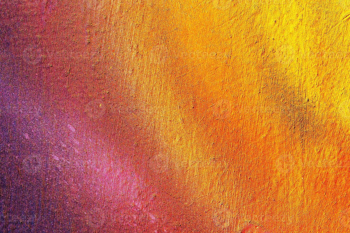 A fragment of colorful graffiti painted on a wall. Abstract urban background. photo