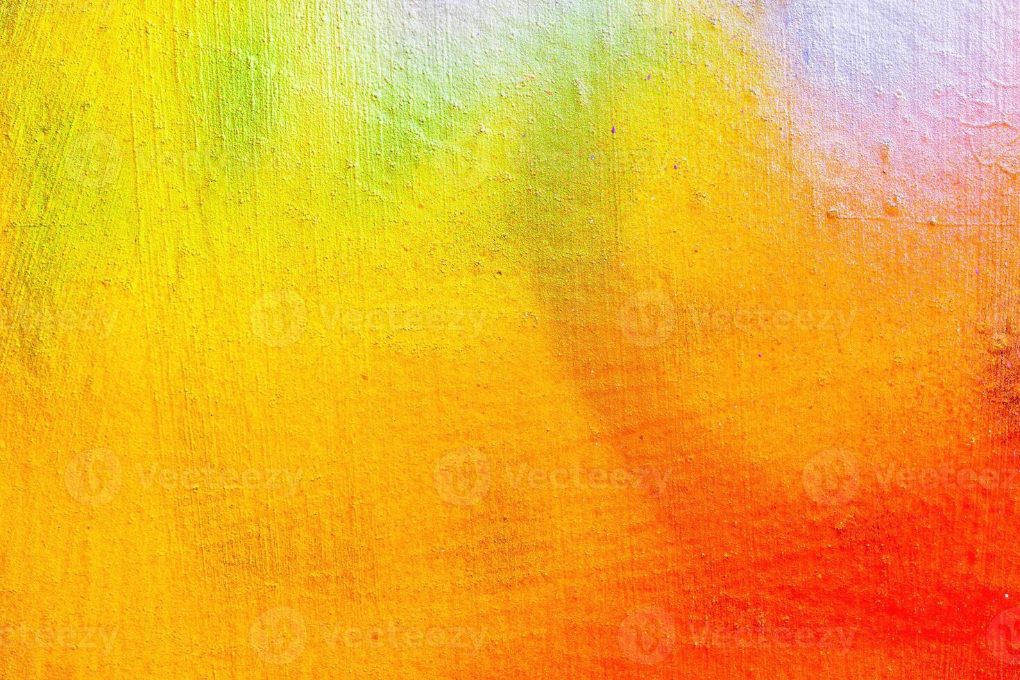 A fragment of colorful graffiti painted on a wall. Abstract urban background. photo