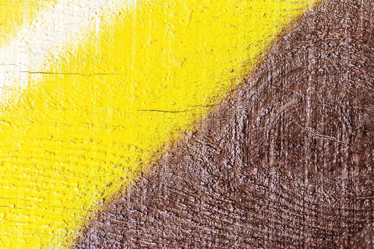 A fragment of colorful graffiti painted on a wall. Abstract urban background. photo