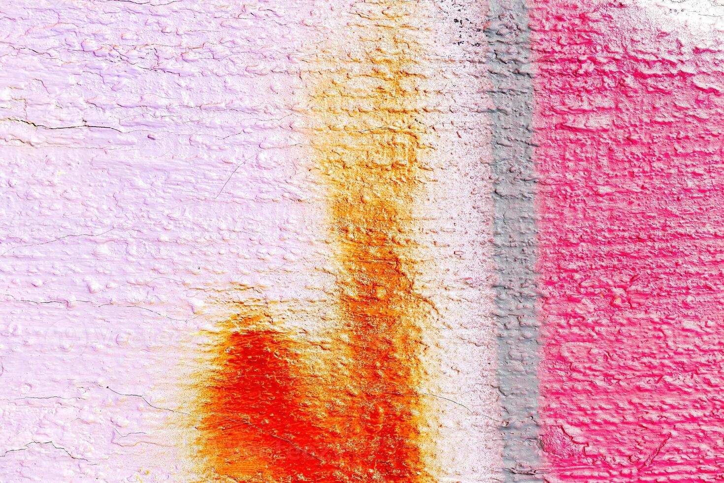 A fragment of colorful graffiti painted on a wall. Abstract urban background. photo