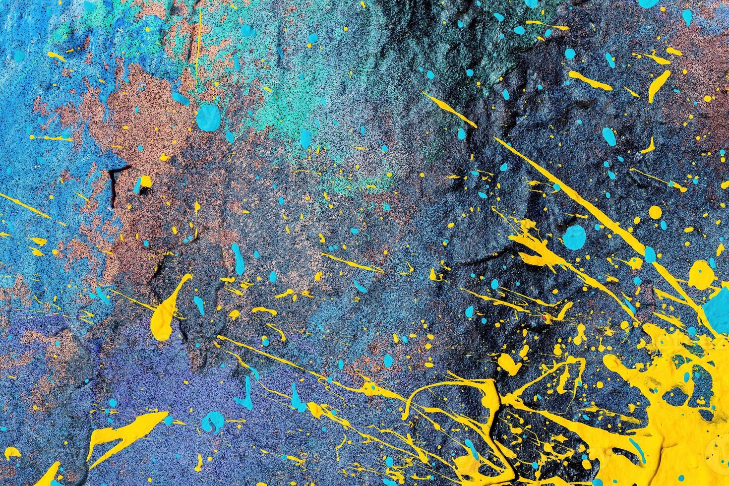 A fragment of colorful graffiti painted on a wall. Abstract urban background. photo