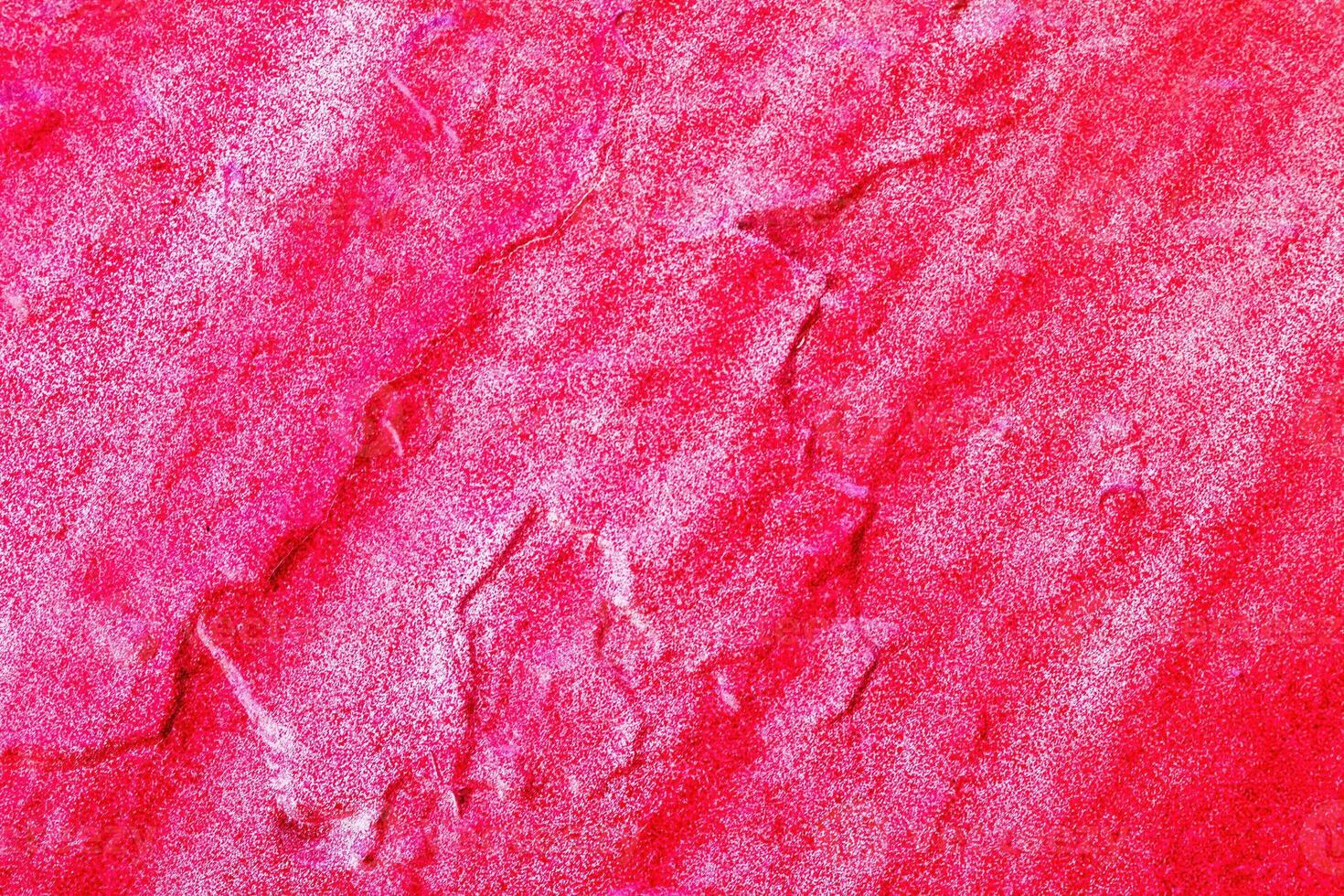A fragment of colorful graffiti painted on a wall. Abstract urban background. photo