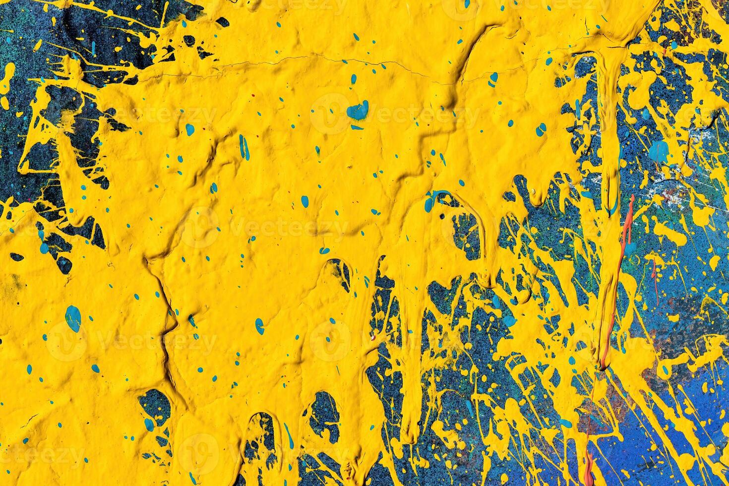 A fragment of colorful graffiti painted on a wall. Abstract urban background. photo