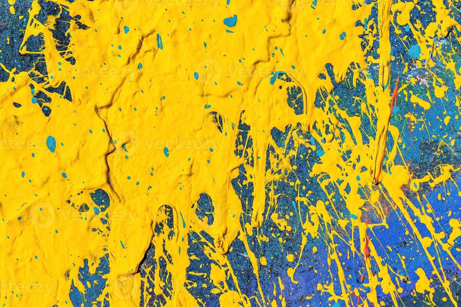 A fragment of colorful graffiti painted on a wall. Abstract urban background. photo
