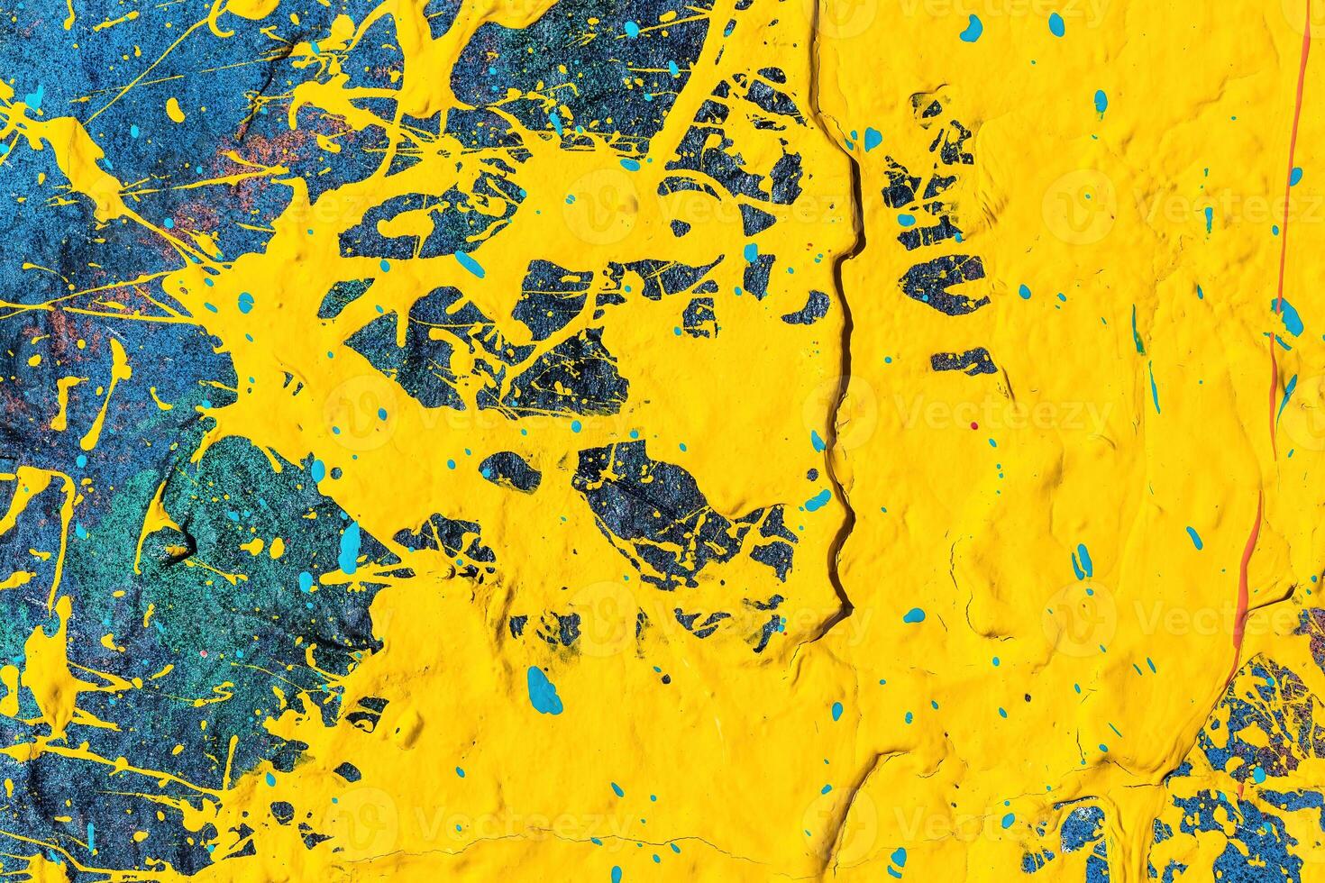 A fragment of colorful graffiti painted on a wall. Abstract urban background. photo