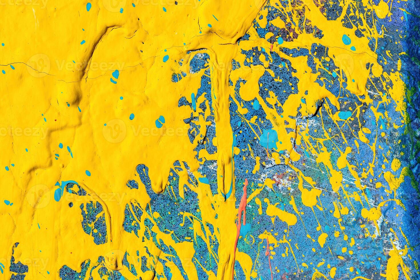 A fragment of colorful graffiti painted on a wall. Abstract urban background. photo