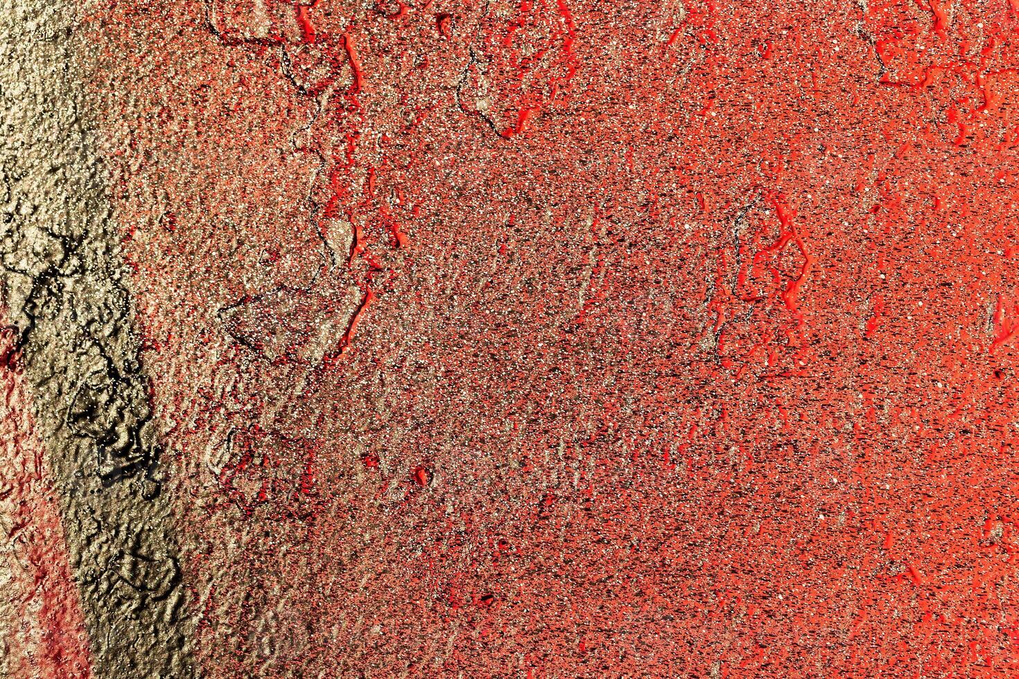 A fragment of colorful graffiti painted on a wall. Abstract urban background. photo